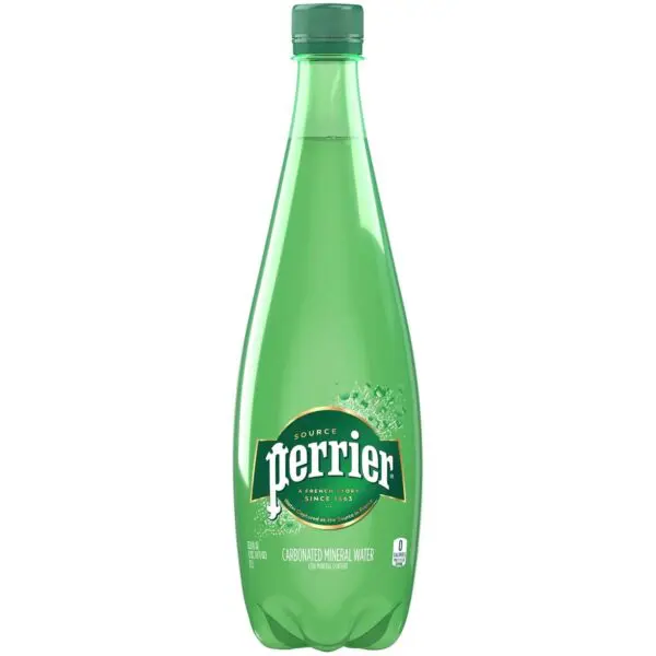 Sparkling mineral water in green bottle