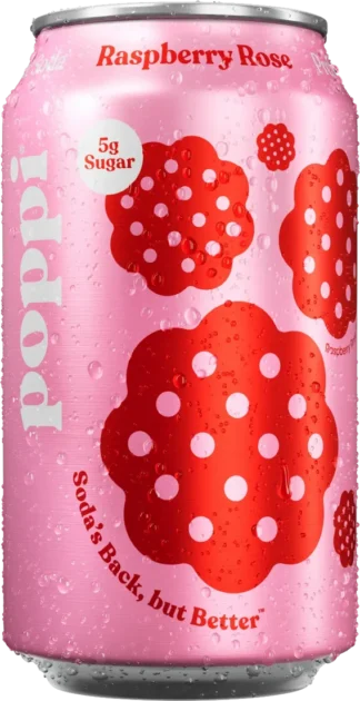 Close-up of a pink beverage can with red flower-like patterns and water droplets.